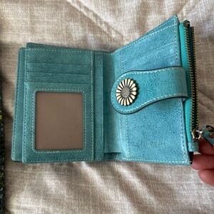 Elegant Turquoise Wallet with Floral Accent
